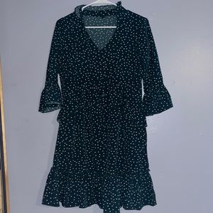 knee length dress with elbow length sleeves.